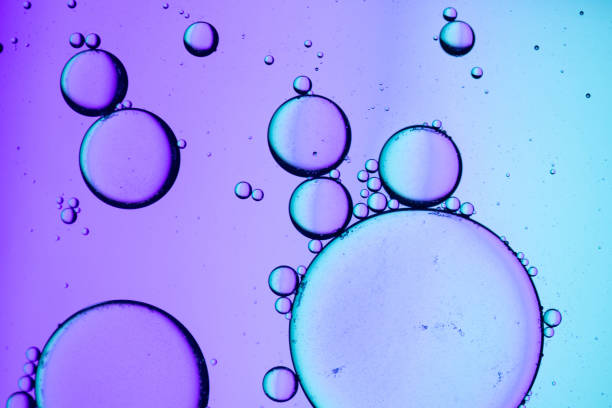 istock Abstract oil drops in a water 2022804923