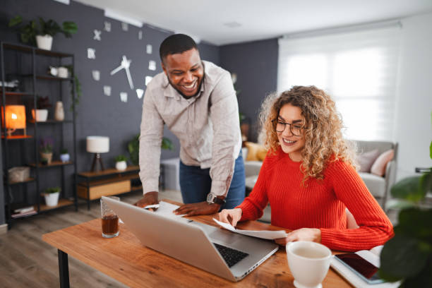 istock Multiracial couple doing home finances together 2022810821