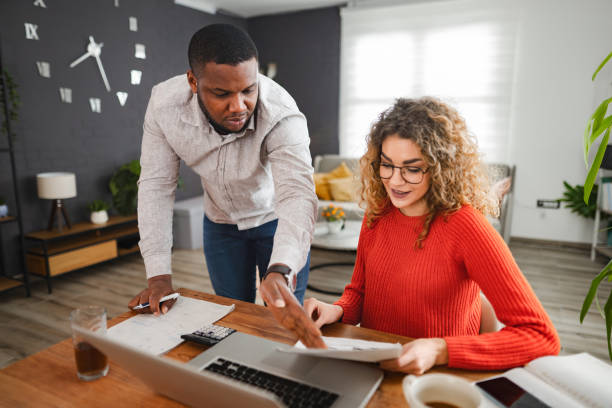 istock Multiracial couple planning their home finances together 2022811894