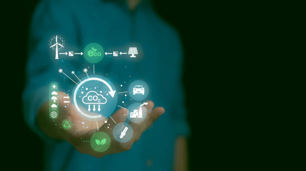 istock A Man hand showing globe with CO2 reducing icon with virtual and carbon credit to limit global warming from climate change concept. World for decrease carbon dioxide emission, carbon footprint. 2022867943