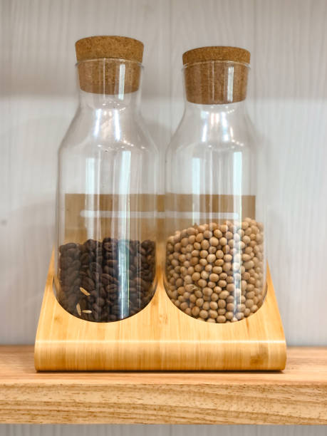 istock A warm home kitchen is decorated with cooking utensils and spices for cooking. Placed on the shelf, it looks beautiful and simple. 2022869824