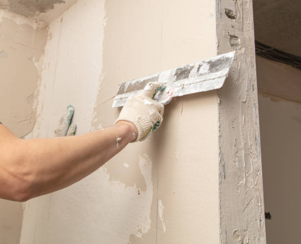 istock A worker is plastering the walls of a house under construction 2022887213