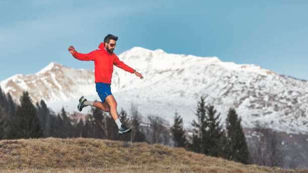 istock Man jumps running in the mountains 2022890037