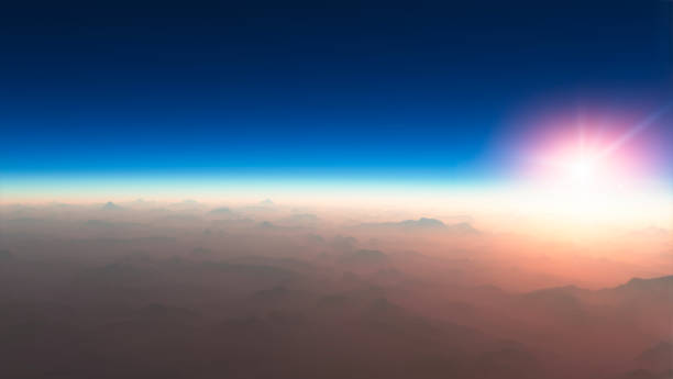 global warming, climate change. ozone hole. aerial view of the sun above the clouds, space stratosphere. mountain relief - cloud cloudscape stratosphere above imagens e fotografias de stock