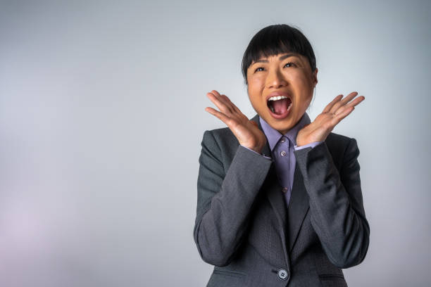 istock Asian businesswoman cheering 2022961434