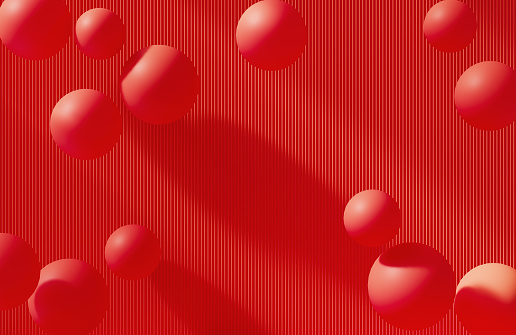 Red spheres over red background. Horizontal composition.