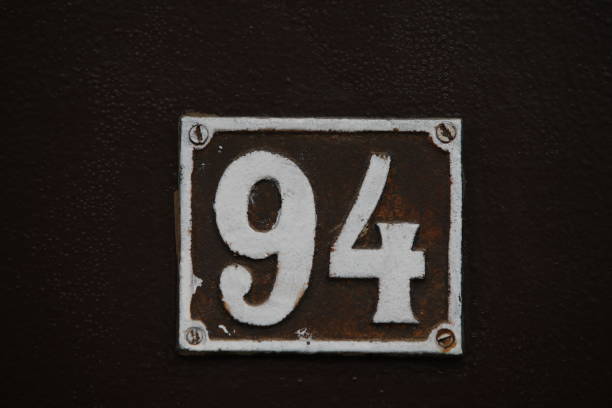 istock Vintage square ceramic street number plate with number. 2022984376