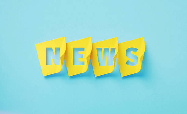 A torn piece of newspaper on white background