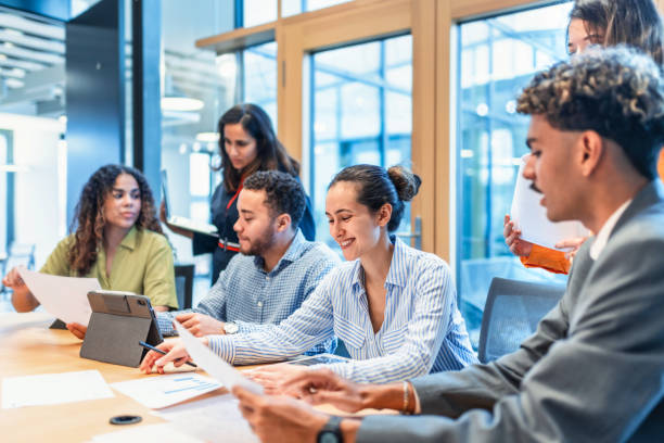 istock young diverse business team in meeting in office 2022995534