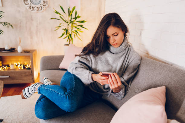 istock A young woman texting messages on her mobile phone 2023007524