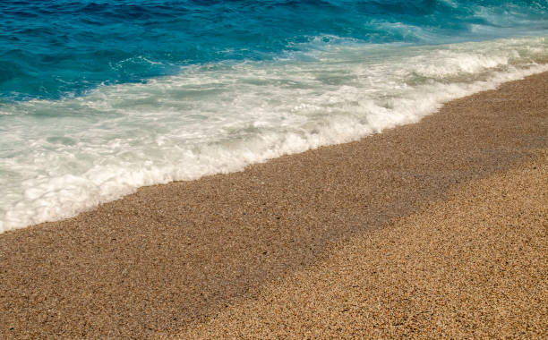 istock Beautiful beach with waves and pebbles, Carboneras, Spain. 2023023399