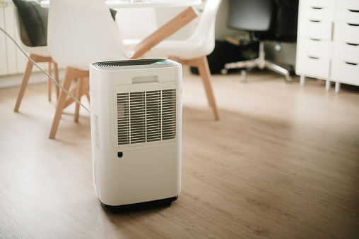 A large dehumidifier inside a house