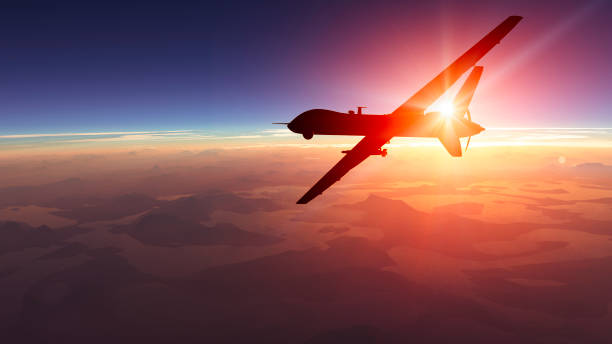 istock Mountain reliefs, war operations, sci-fi, night vision with blue hues. Military target. Drone flying over an area. Military operation 2023053514