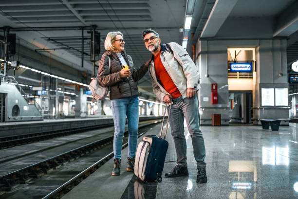 istock Mature couple waiting for their subway 2023073147