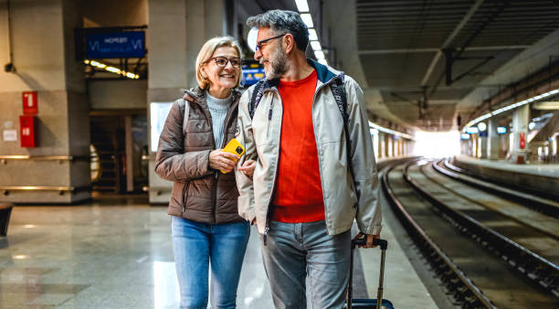 istock Mature couple at railway station 2023082185