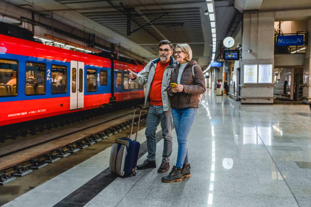 istock Mature couple at railway station 2023083239