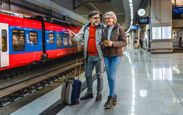 istock Mature couple at railway station 2023083759