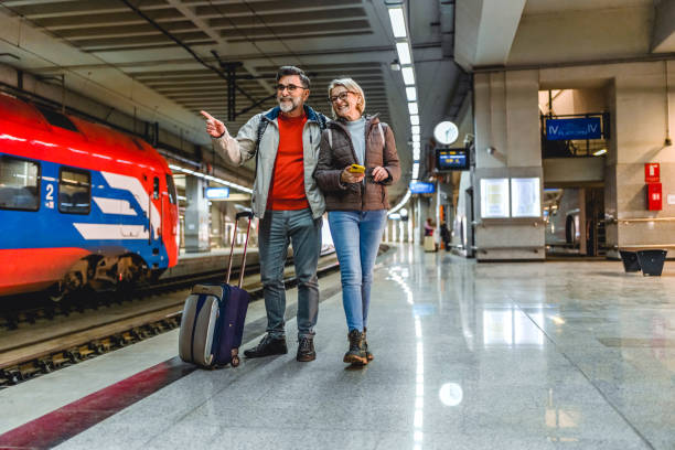 istock Mature couple at railway station 2023083782