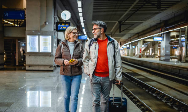 istock Mature couple at subway station 2023086439
