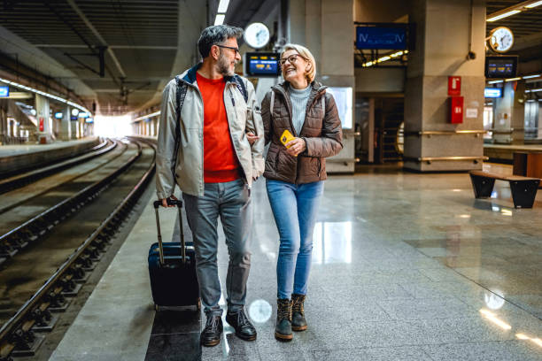 istock Mature couple at railway station 2023086974