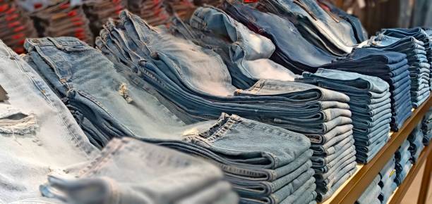 istock stacks of denim pants are on the counter 2023139705