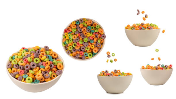 istock Colorful rings cereal spill out into a bowl. Breakfast. Isolated. 2023146049