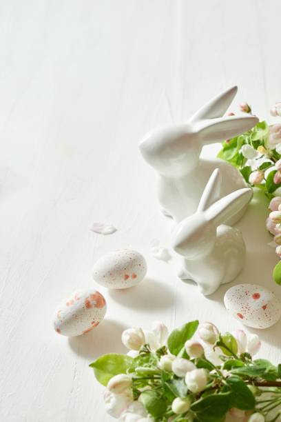 istock Holiday composition with spring flowers and easter eggs, white bunny on a light background.  Happy easter concept with copy space 2023146627