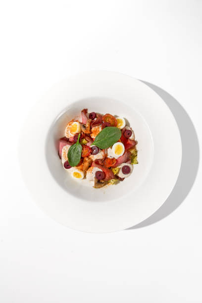 istock Roast Beef Salad with Quail Eggs and Vegetables Top View 2023147754