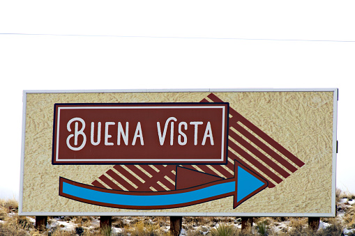Buena Vista, Colorado, USA - February 10, 2024: A sign welcomes visitors to the town of Buena Vista in the Rocky Mountains on a winter afternoon.