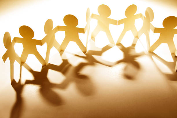 istock Team holding hands united 2023239589