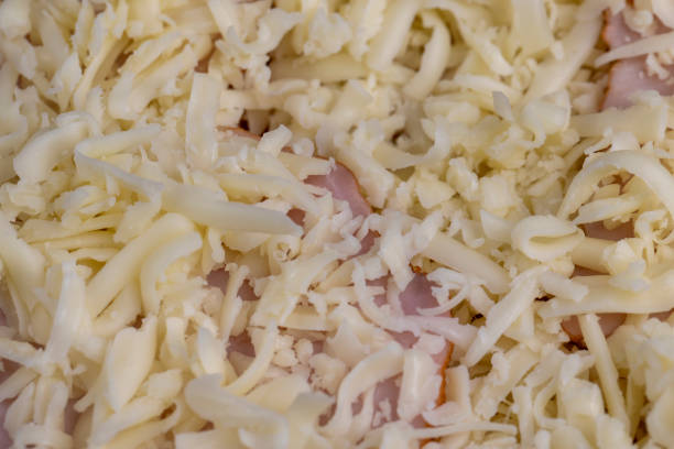 istock pizza dough with cheese and meat 2023239619