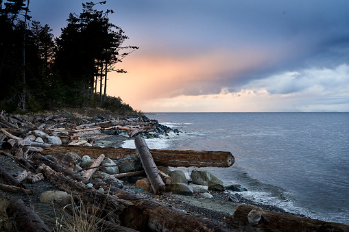 Sunset on a rocky beach near Brookings Oregon in the Southern Oregon Coast.