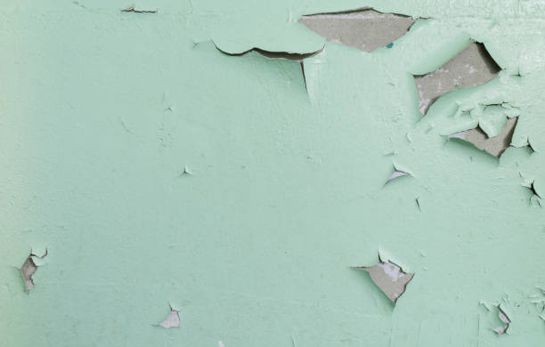 istock Cracked pastel green wall paint background. Interior decoration. 2023374760