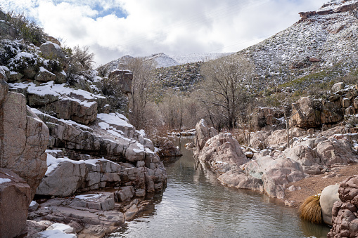 Snow-capped rocks along the banks of the East Verde River, outside of Payson, in the Tonto National Forest.