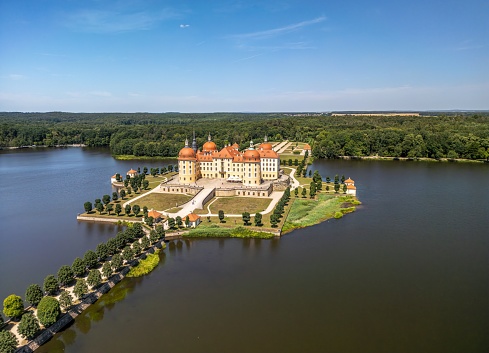Moritzburg, Germany- July 15,2023: The drone aerial view of moritzburg castle (german: schloss moritzburg). moritzburg palace is a baroque palace in moritzburg, in the german state of saxony.