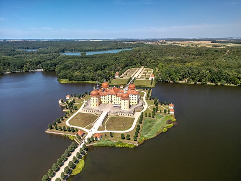 Moritzburg, Germany- July 15,2023: The drone aerial view of moritzburg castle (german: schloss moritzburg). moritzburg palace is a baroque palace in moritzburg, in the german state of saxony.