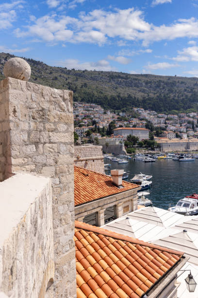 view from medieval city walls with bastion of st. john of old port with moored boats, dubrovnik; croatia - waterbreak fortified wall nobody outdoors 뉴스 사진 이미지