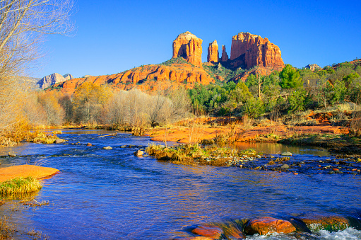 View to Cathedral Rock from Crescent Moon Picnic Site near Sedona, Arizona, with the Oak Creek in front.