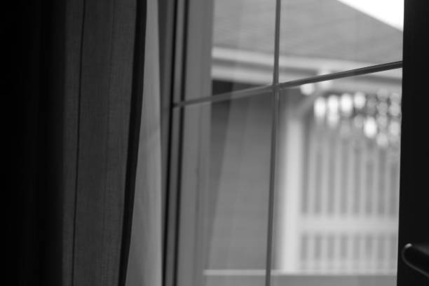 istock black and white window close up 2023422180