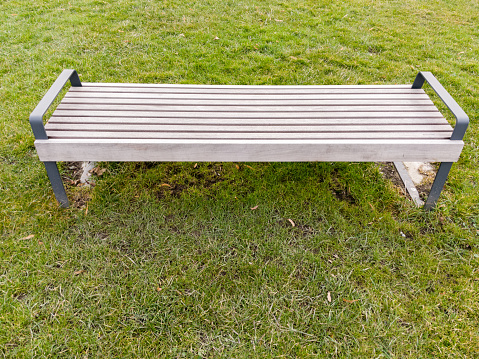 White bench in the park 