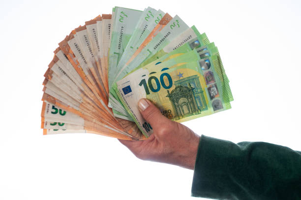 Hand showing a fan of banknotes