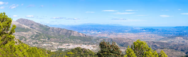 istock Panoramic view on pine forest on hiking trail to peak Torrecilla 2023488998