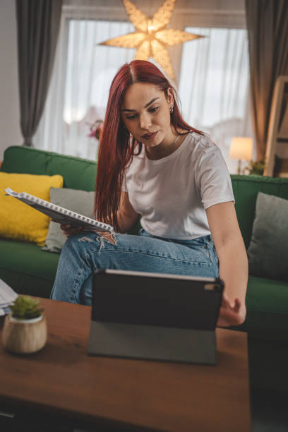 istock young caucasian woman student study at home learn exam prepare lesson 2023529690