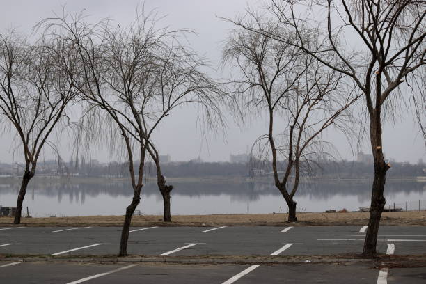 istock Deserted parking lot by the lake 2023533859