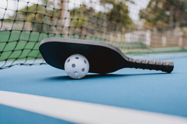 istock Pickleball racket and ball 2023550427