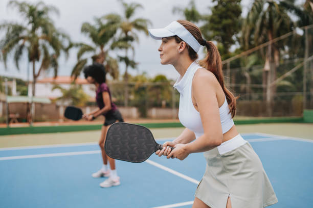 istock Two friends playing pickleball 2023550998
