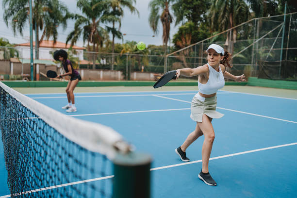 istock Female duo playing pickleball 2023552036