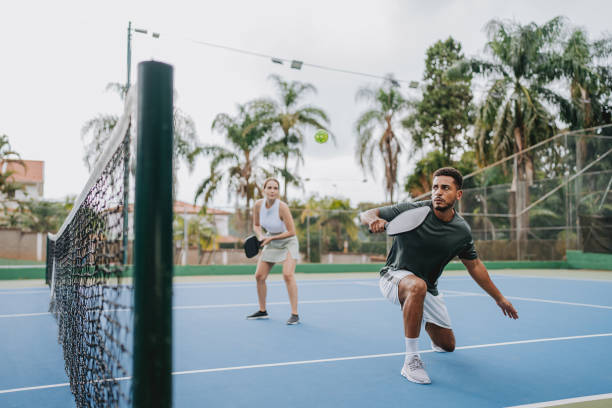 istock Two friends playing pickleball 2023556246