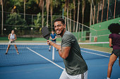 People playing pickleball