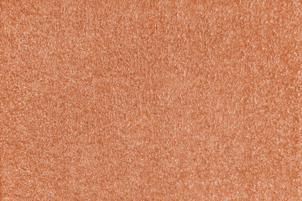 istock Texture background of orange fabric. Upholstery jacquard texture cloth, boucle textile material 2023635834